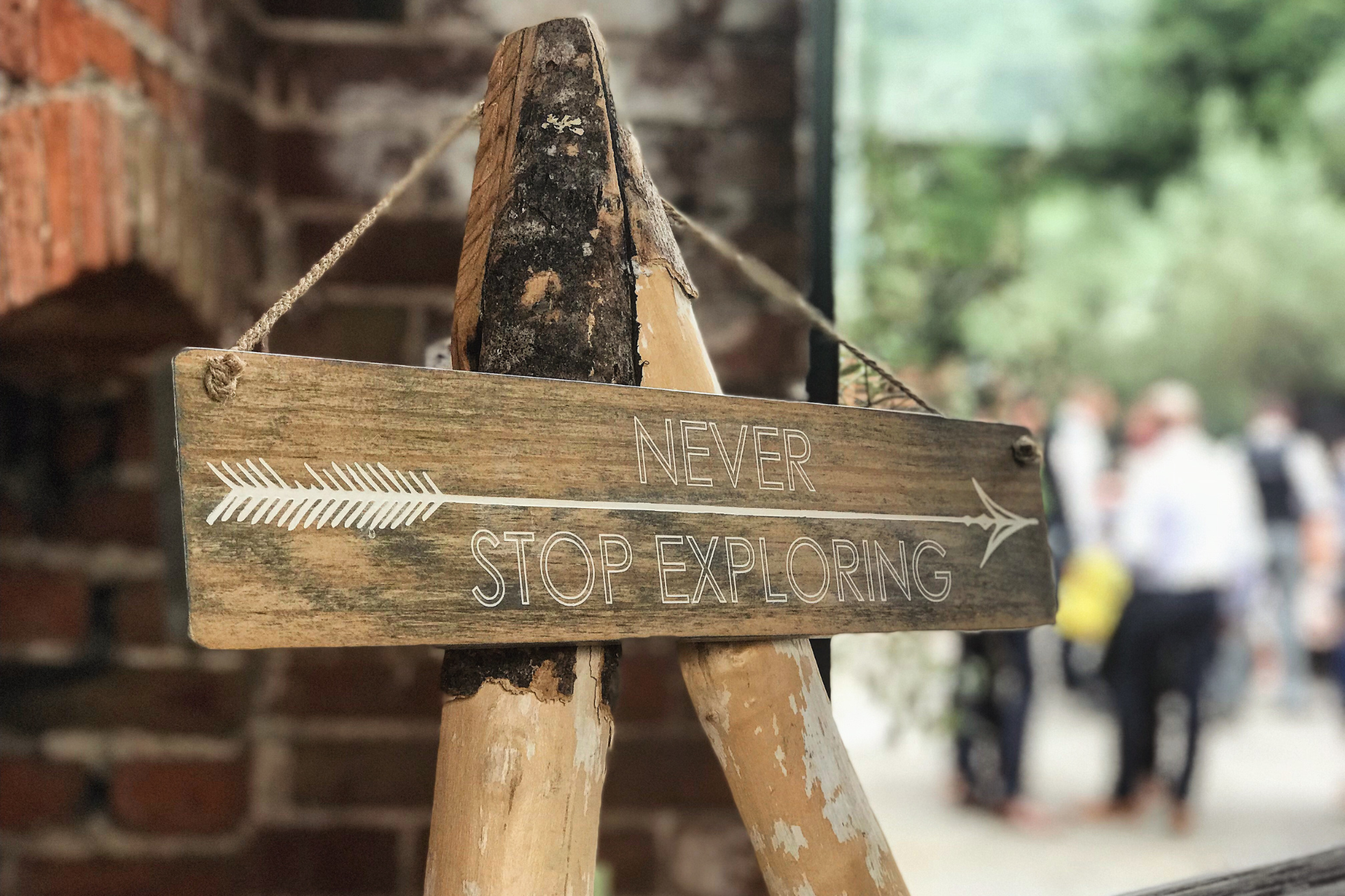 a sign that says to never stop exploring
