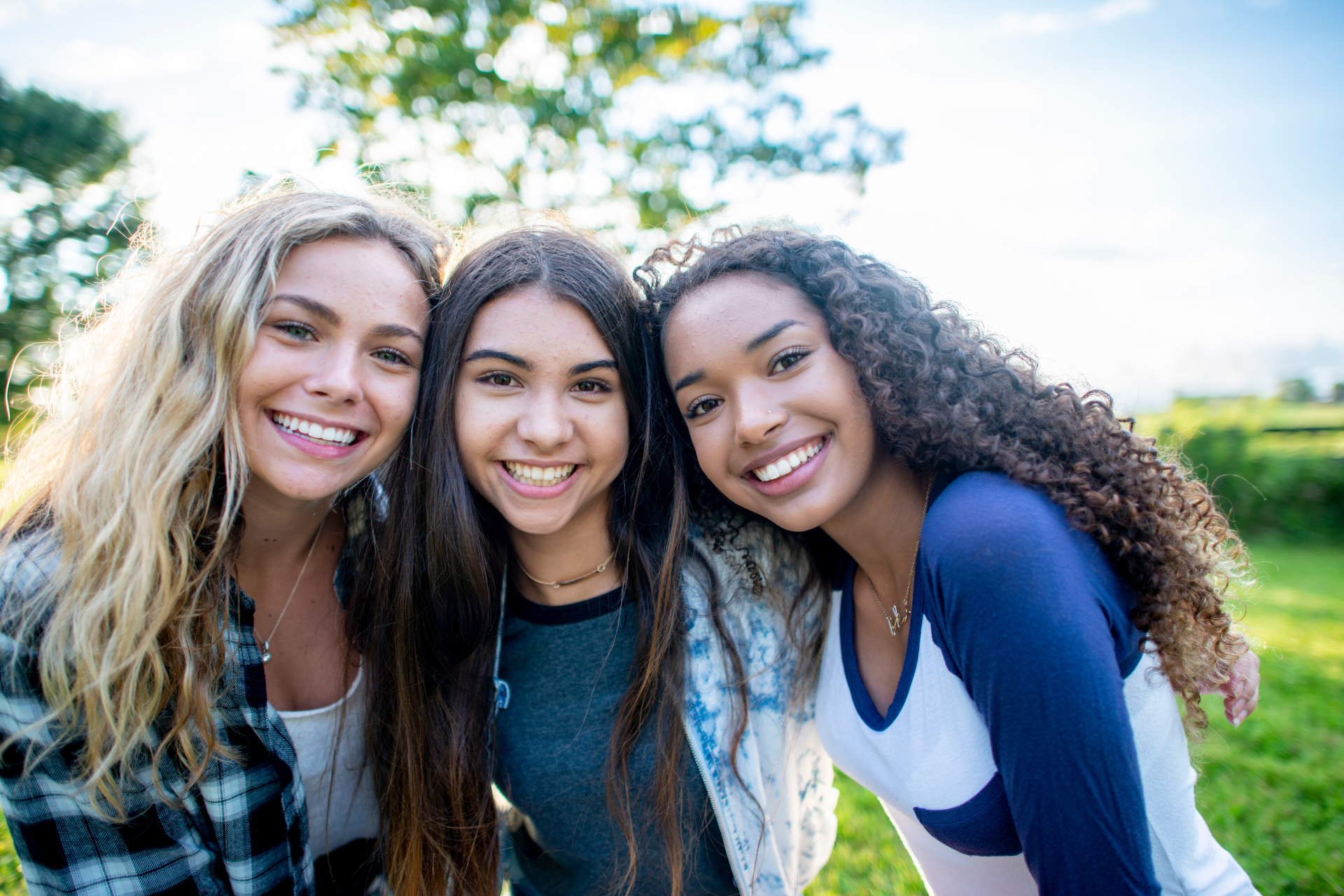 teenagers hanging out at a park